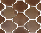 arabesque pattern in brown terracotta tile